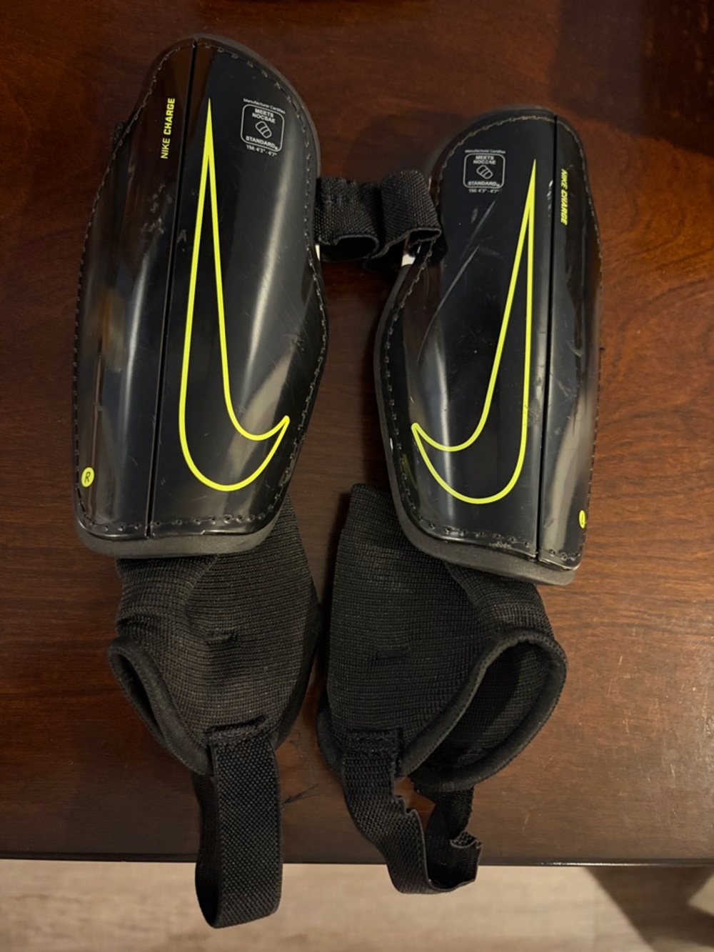 Nike Charge Soccer Shin Guards - black and yellow - youth medium